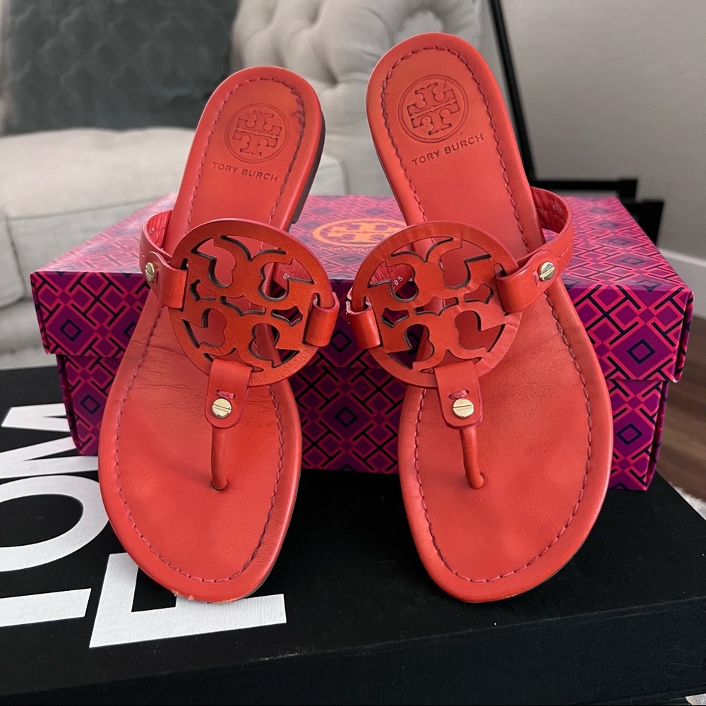 TORY BURCH Miller flip flops size 7 in Tiger Lily color (orange)